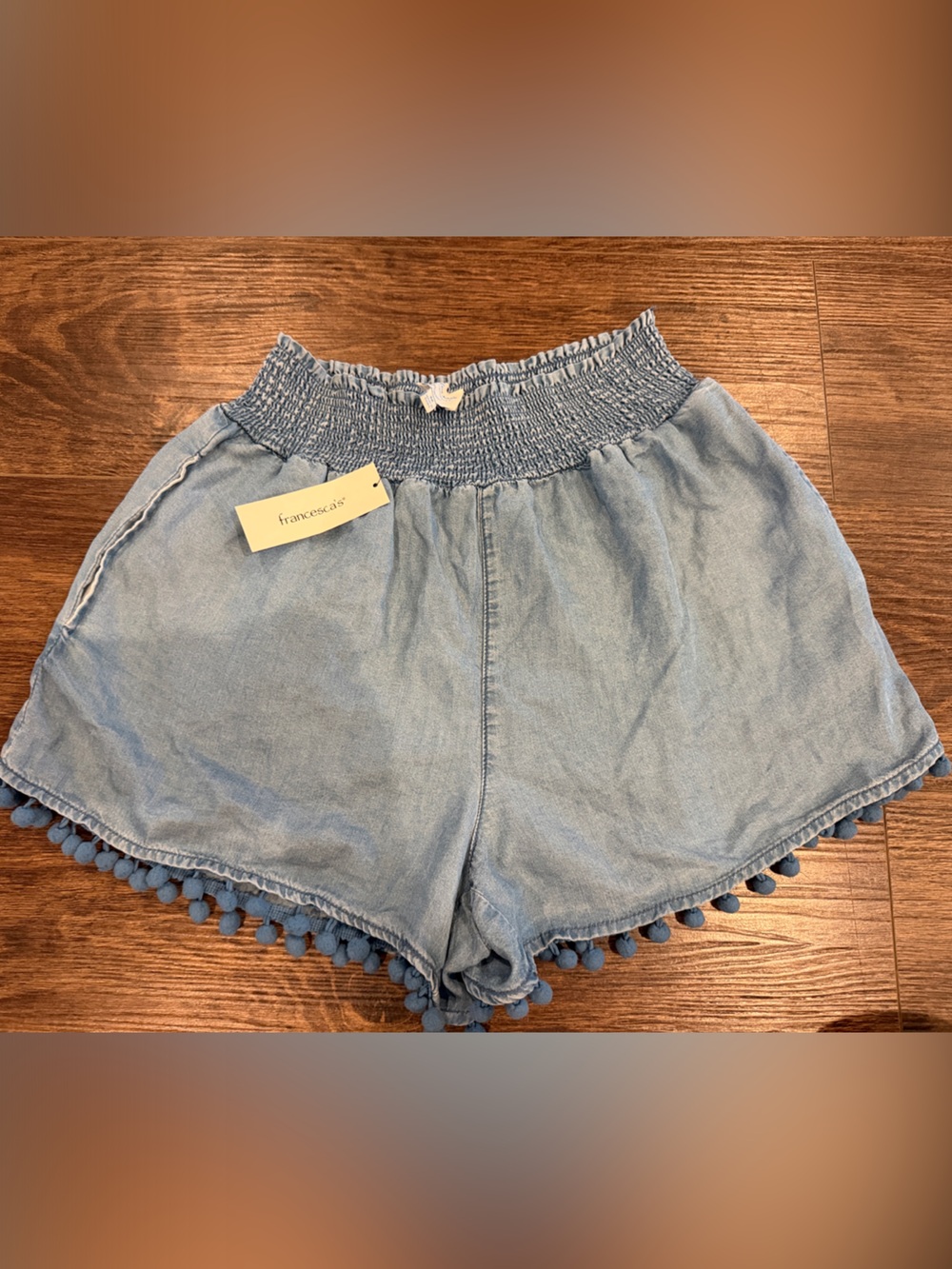 Francesca's Collections Light Blue Denim Pom Pom Trim Shorts